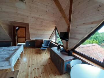 Фото номера Номер-студио с видом на сад Апартаменты Natura Apartamenty г. Swaderki 8