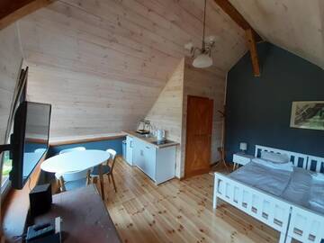Фото номера Номер-студио с видом на сад Апартаменты Natura Apartamenty г. Swaderki 6